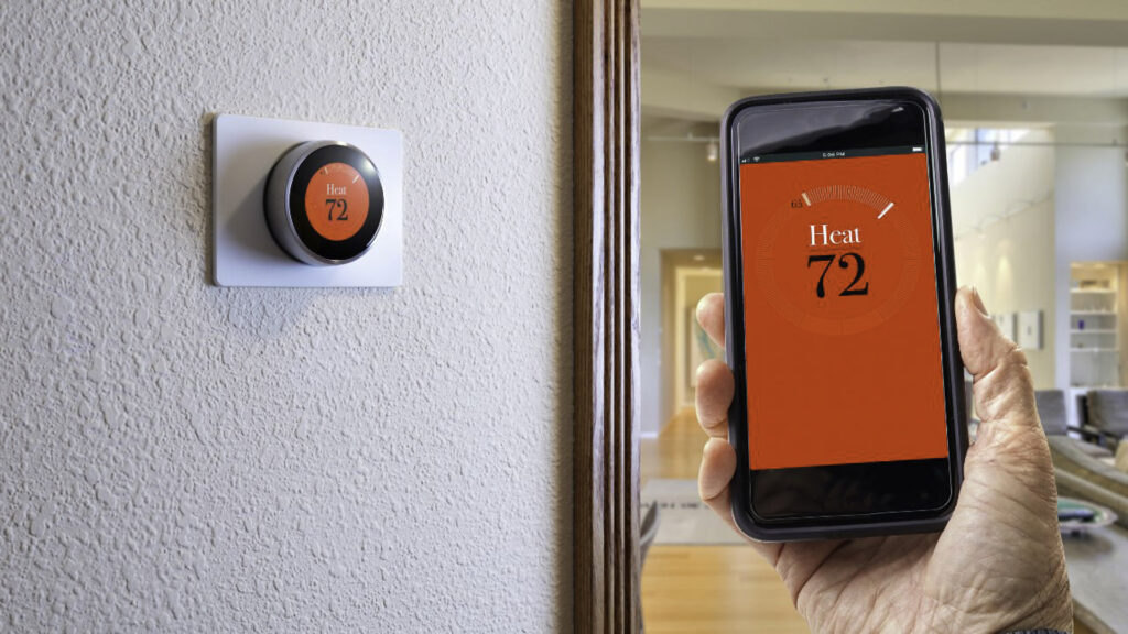 A smart thermostat is one that you can control straight from your phone. This means you can control your heating and air conditioning temperature from anywhere. 